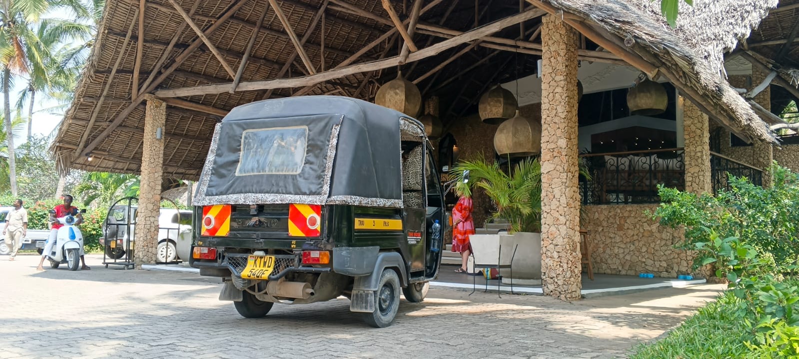 Tuk tuk waiting outside a beach restaurant in Watamu