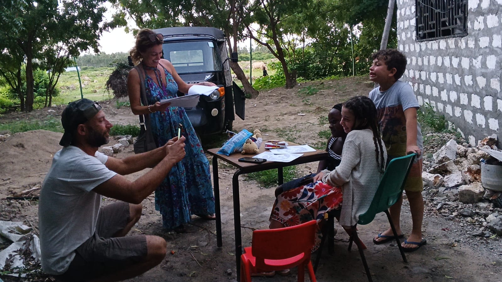 Guests spending time with local children in Watamu